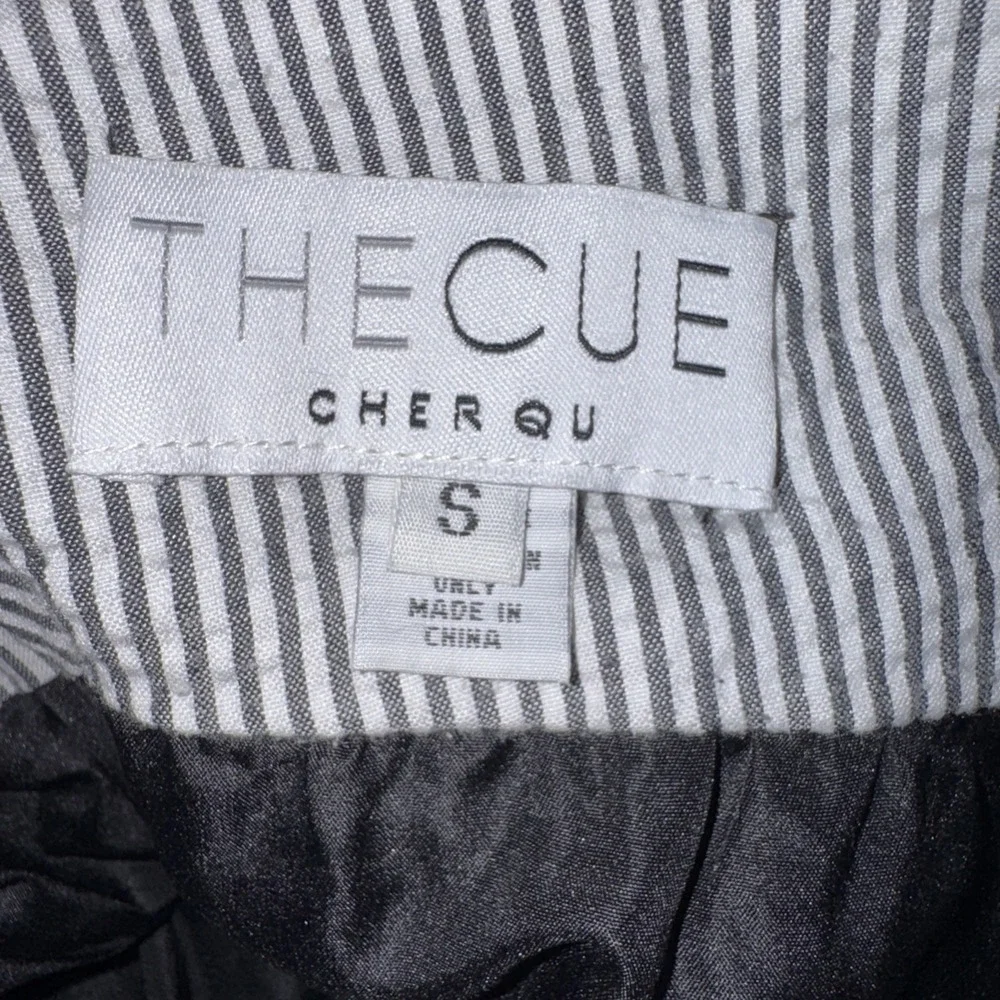 The Cue cue cher